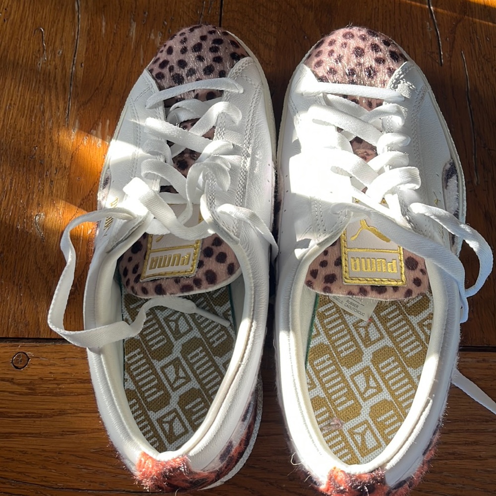 Puma animal print sneakers.